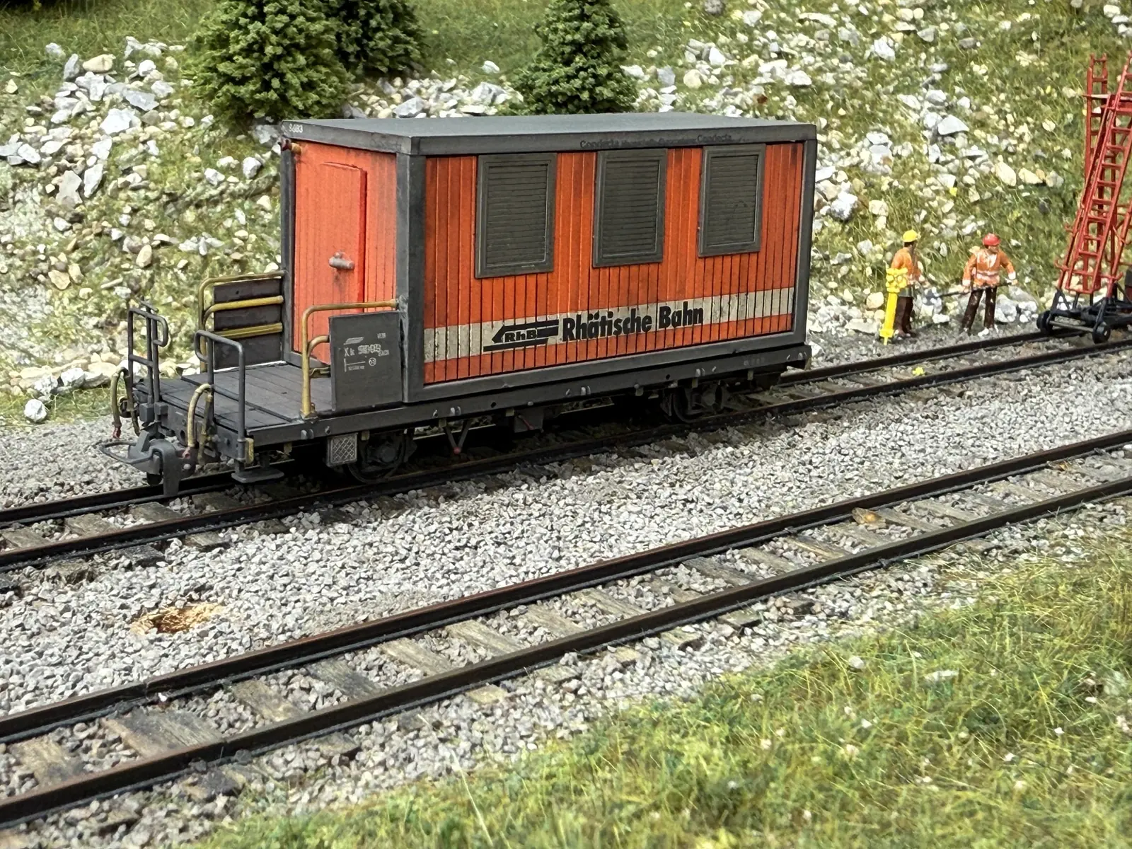 Orange RhB service wagon on the layout
